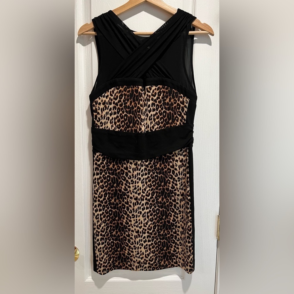 Bebe size medium sexy leopard print dress.